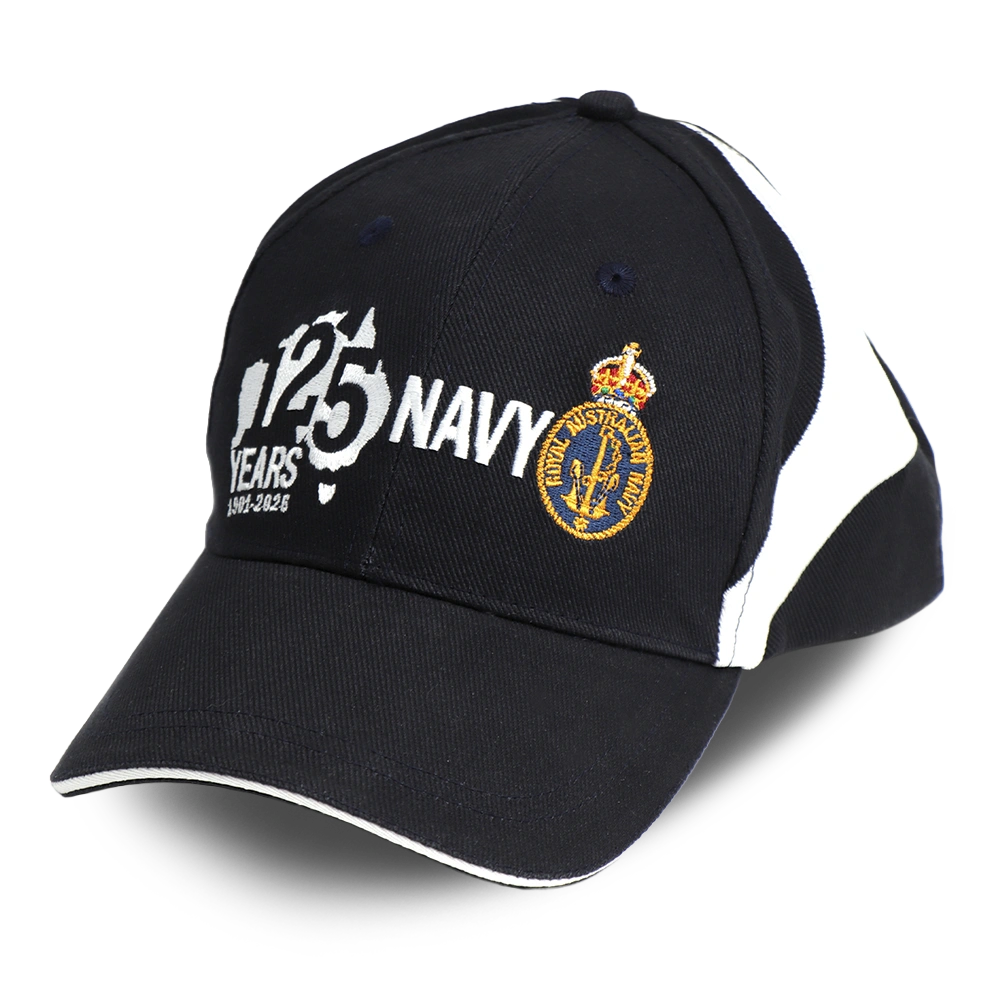 Royal Australian Navy 125th Anniversary Desk Paper Weight on a Desk