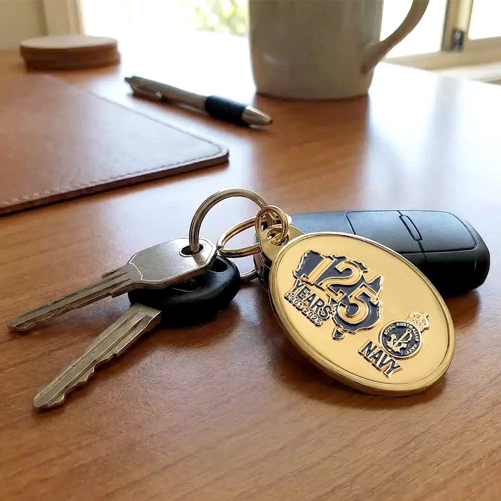 Royal Australian Navy 125th Anniversary Desk Paper Weight on a Desk